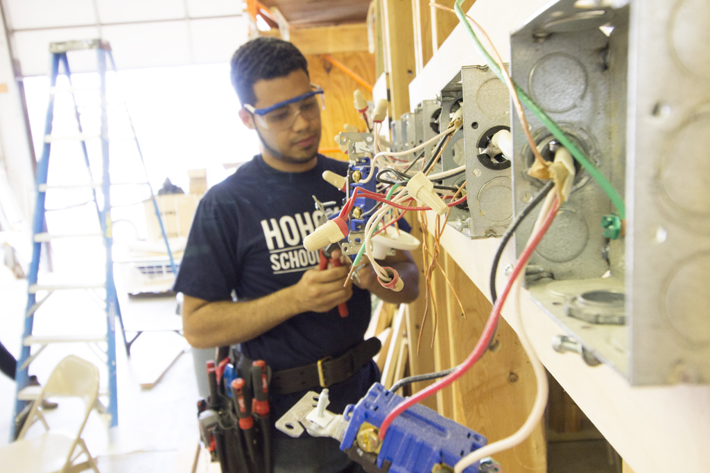 Electrician Apprenticeship student practices wiring